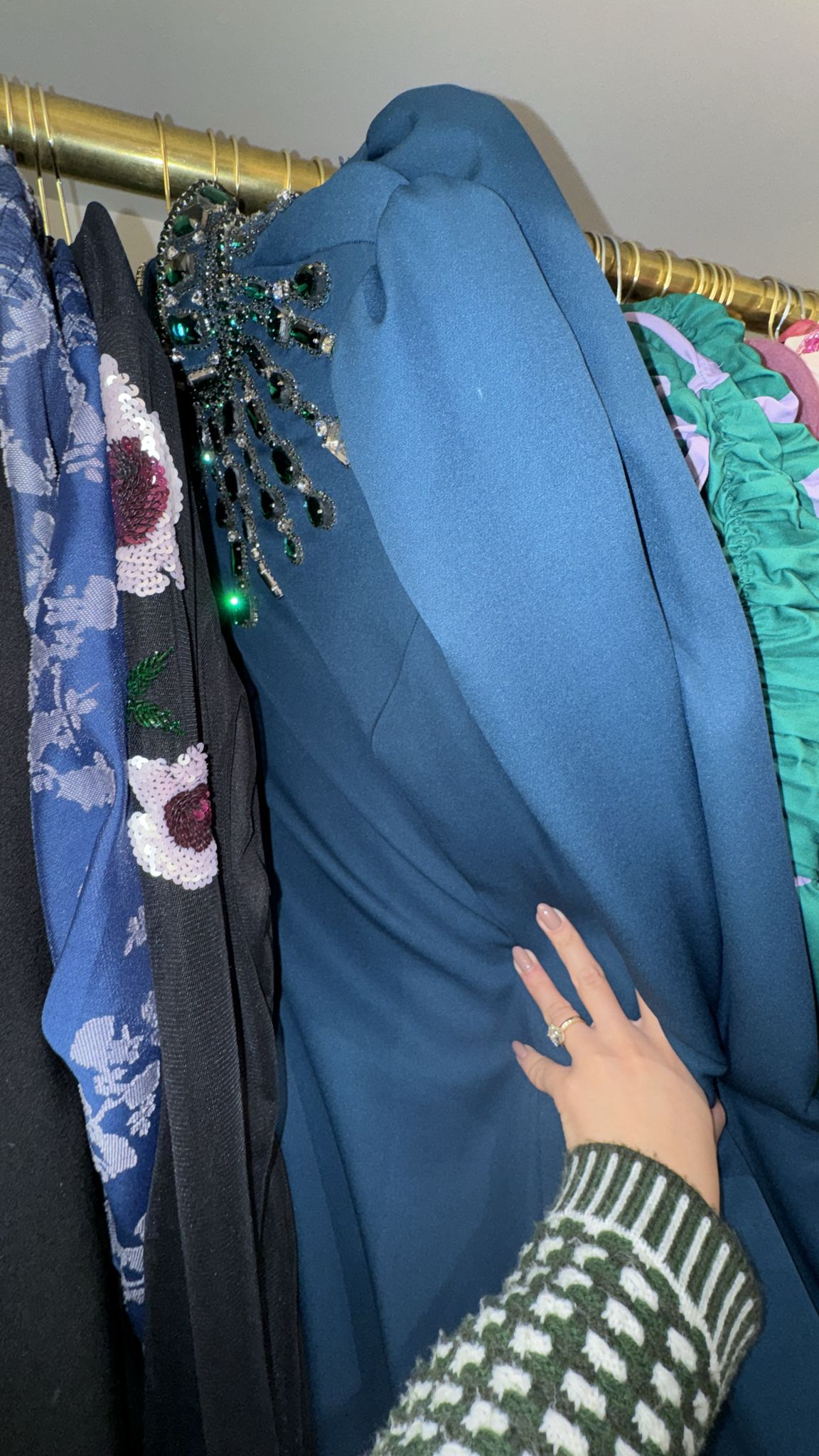 Teal gown with emerald stones